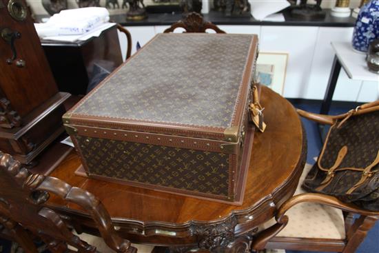 A large Louis Vuitton suitcase, 21in.